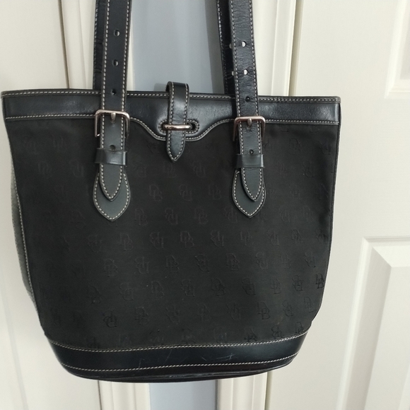 Dooney & Bourke Handbags - Dooney and Bourke Vintage Cabriolet Bucket Bag Black